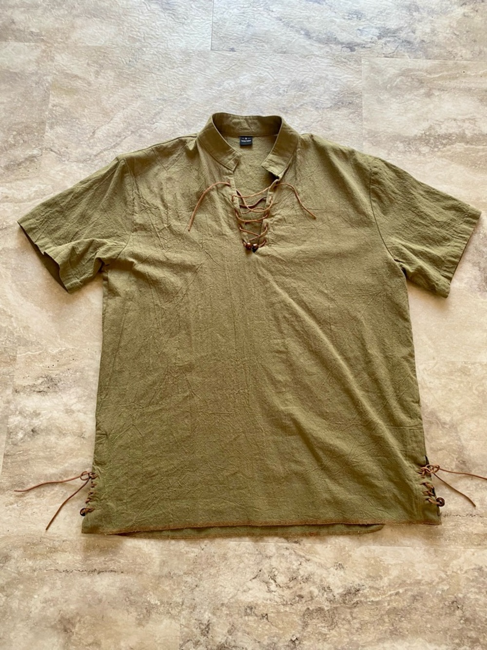 Olive poet shirt.  Men’s small. Will also fit women.